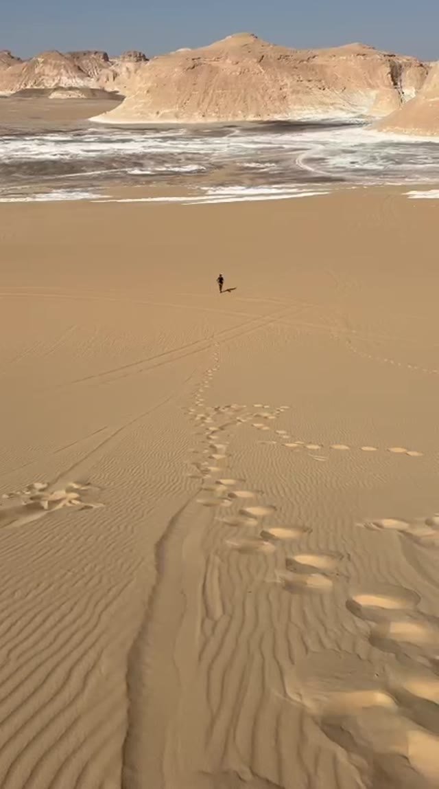 Footsteps in the dunes — frame from Sekhmet’s existing video